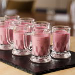 Close up of a plate of pink fruit smoothies as part of mercure hotels meeting food offering