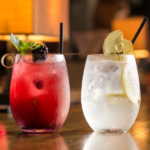 Two glasses of frozen lemonade on bar counter