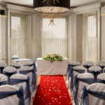 the acorn suite set for a wedding ceremony at Mercure Bristol North The Grange Hotel in front of the large bay window