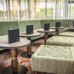 comfortable stools and tables in the bar at Mercure Bristol North The Grange Hotel