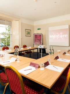 Cedar meeting room ready for a meeting at Mercure Bristol North The Grange Hotel with a view out of the window