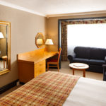 Image of a family room with double bed and sofa bed at Mercure Bristol North The Grange Hotel
