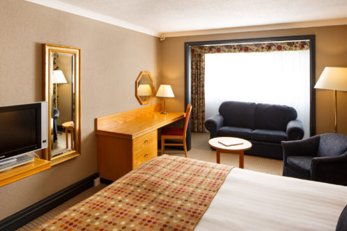 Image of a family room with double bed and sofa bed at Mercure Bristol North The Grange Hotel