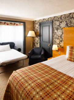 Image of a family room with double bed and sofa bed at Mercure Bristol North The Grange Hotel