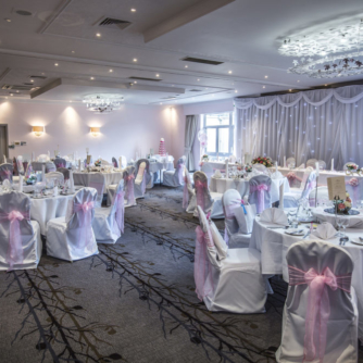 tables in the park suite set for a wedding breakfast at Mercure Bristol North The Grange Hotel