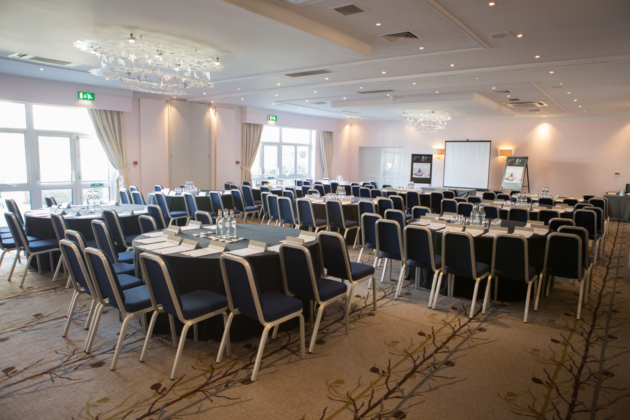 Park Suite Meeting room table laptop and notepad at mercure hotels